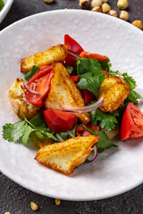 Fried brie with tomato salsa.