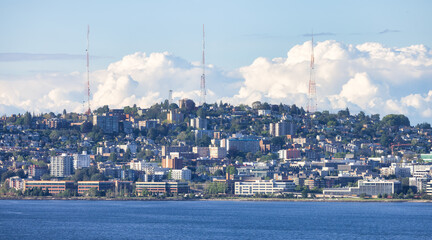 Fototapeta na wymiar Downtown Seattle, Washington, United States of America. View of the Modern City on the Pacific Ocean Coast. Cloudy Blue Sky.