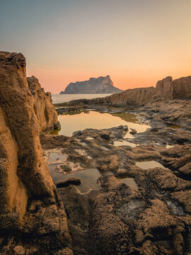 Natural coastal landscape and the Ifaz rock in the background