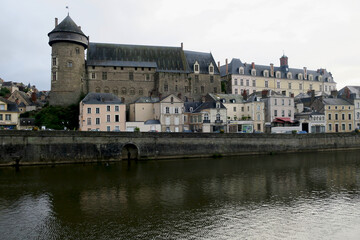 Fototapeta na wymiar View of Laval (France) and its castle from the river Mayenne