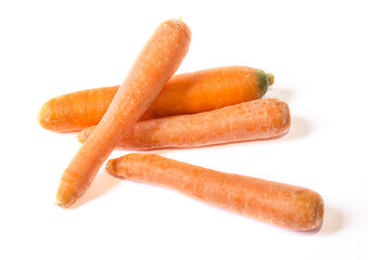 several carrots are lying on a white background