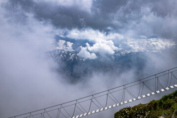 suspension bridge between mountains