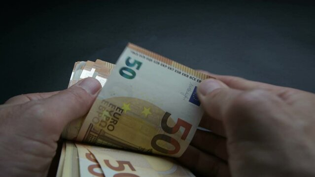 bill of 50 euro paper money cash - 50 eur notes - Banknote on black background - european banknotes of the money of the euro currency - isolated on Black Background