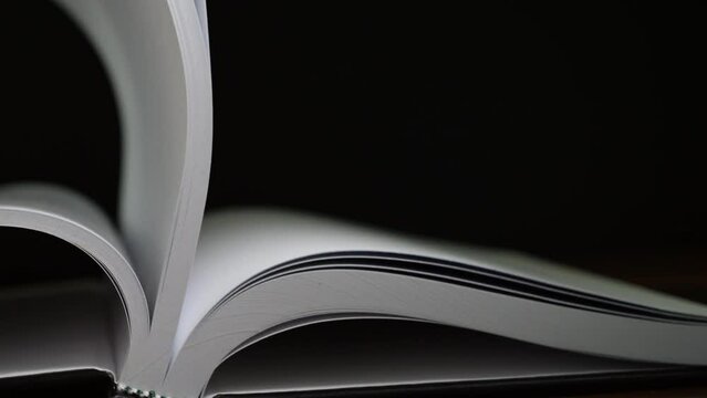 4K-Slow motion of book flip fast and pages move from side to side, Education and business concept