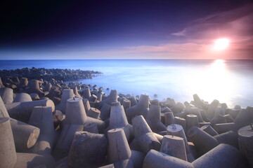 Obraz premium Sun set in glagah beach, Yogyakarta, Indonesia