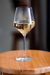 wine glass in the sunset on a chair