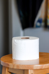 toilet paper roll on chair