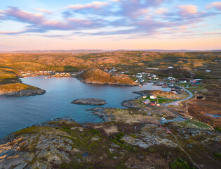 Sunrise over a small coastal community