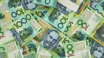 3D rendering of 100 Australian dollar notes spread on surface