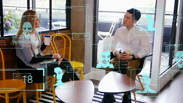 Animation of digital interface over diverse two business people