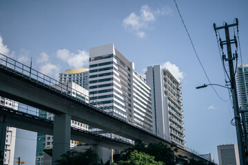 Fototapeta na wymiar downtown city buildings sky Brickell bridge train transport miami 