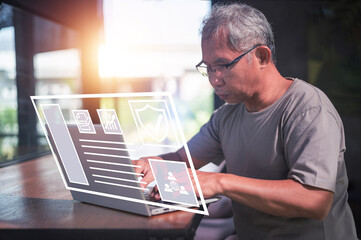 Asian man older buy healthy insurance online at home, Life Insurance Health Protection Concept