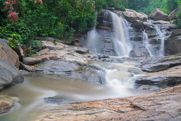 Beautiful Turga waterfall having full streams of water flowing downhill amongst stones , duriing monsoon due to rain at Ayodhya pahar (hill) - at Purulia, West Bengal, India.
