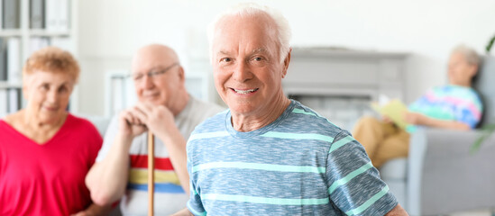 Happy senior man in nursing home