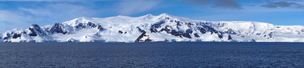 Panorama of snow covered mountains at Portal Point, Antarctica © Angela