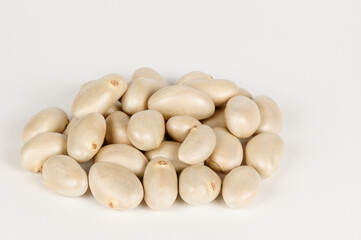 Pile of Jackfruit seeds on a white background