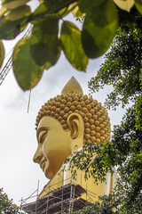 Phasi Charoen district,Bangkok,Thailand on May29,2020:Big golden Buddha statue named "Phra Buddha Dhammakaya Thepmongkhon" (under construction)