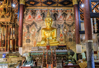 Fototapeta na wymiar Nan Province,Northern Thailand on December20,2019:Principal Buddha statue inside the vihara(main hall),Wat Nong Bua,Tha Wang Pha District. 