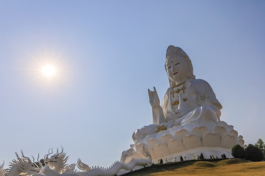 Chiang Rai Province,Northern Thailand on January 19,2020:White Guan Yin Statue and beautiful dragon staircases at Wat Huai Pla Kang.