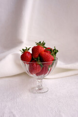 strawberries in a glass bowl