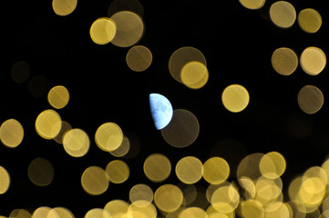  Colorful out of focus lights blurred and moon