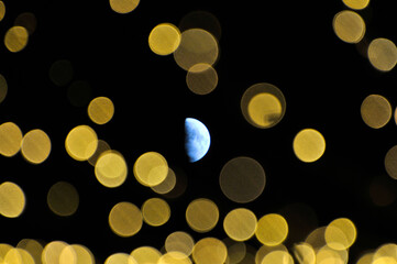  Colorful out of focus lights blurred and moon