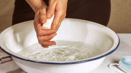 hands mixing dough