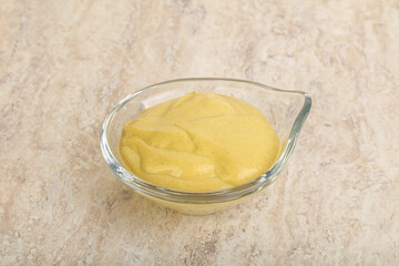 Organic mustard sauce in the bowl