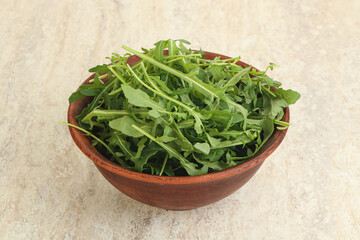 Fresh green arugula in the bowl