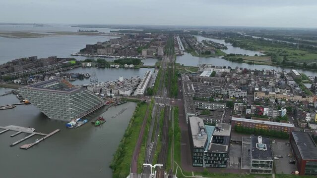 Amsterdam Ijburg hyperlapse timelapse artificial island modern residential area smart city cityscape at water Ijmeer. Urban houses buildings city environment area.