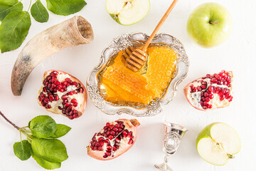 flat layout of traditional treats for New Year Rosh Hashanah. white background. top view.