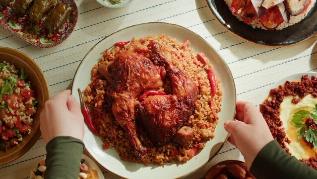 Kabsa top view, rice and meat dish, saudi arabia national traditional food. Muslim family dinner, Ramadan, iftar. Arabian cuisine. Religious holiday, holy month.