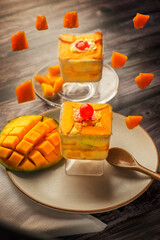 Mango mousse on a plate with copy space