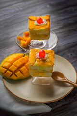 Mango mousse on a plate with copy space