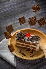 Chocolate pastry on a plate with copy space