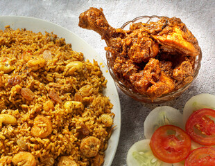 Prawn Pulao, Chicken Curry and salad with copy spcace