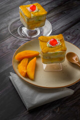 Mango mousse on a plate with copy space