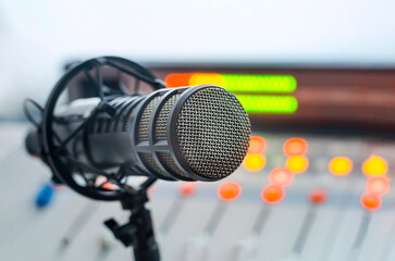 Professional microphone and sound mixer in radio station studio