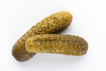 Pickled cucumbers isolated on white.