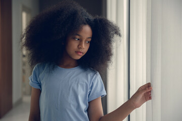 Lonely black teen girl leaved alone at home care depressed mental sick from child abuse domestic violence problem.