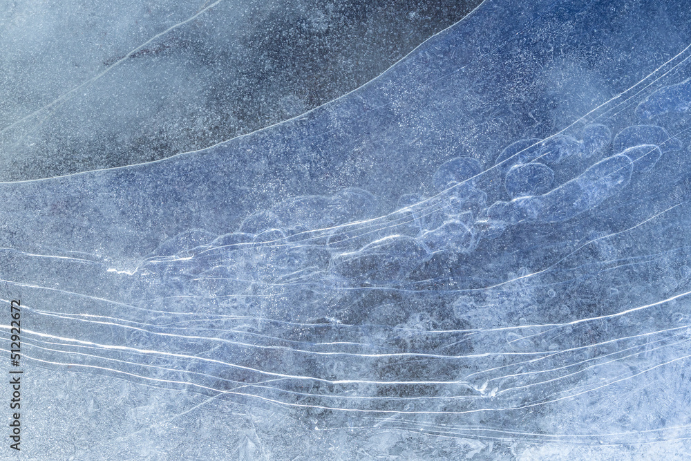 Poster macro close-up of ice on a frozen lake in the winter, viewed from above. abstract full frame texture