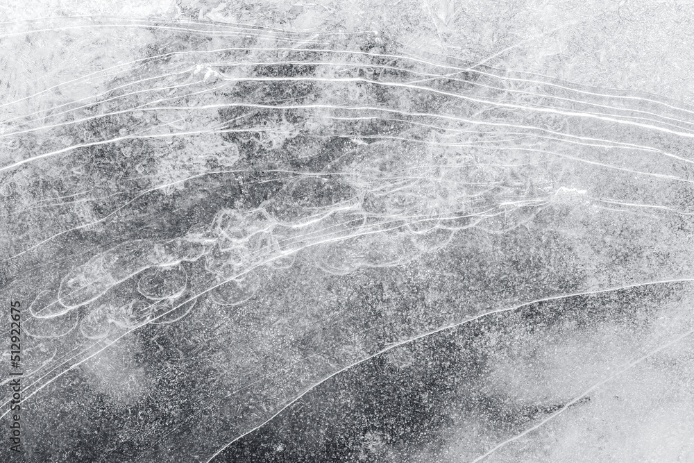 Poster macro close-up of ice on a frozen lake in the winter, viewed from above. abstract full frame texture