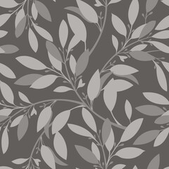 Vector floral seamless pattern. Twigs and light coffee colored leaves on a coffee colored background. 