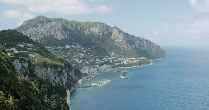 Beautiful view of the harbour of the village of Capri, in Italy, during a sunny day in summer