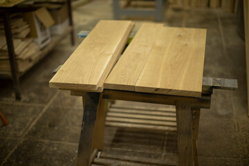 Fototapeta na wymiar Workbench for boards. Table in carpentry workshop.
