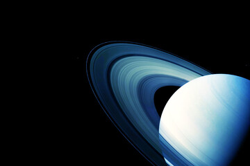 Saturn in unusual colors, on a dark background. Elements of this image were furnished by NASA.