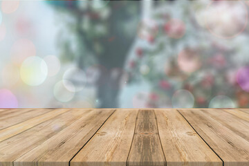 Empty wooden table top with  bokeh on blur  abstract background .