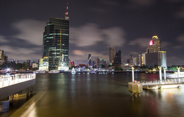 Klongsan,Bangkok,Thailand on April 15,2019:Beautiful night scape of Chao Phraya River and Bangkok skyline.