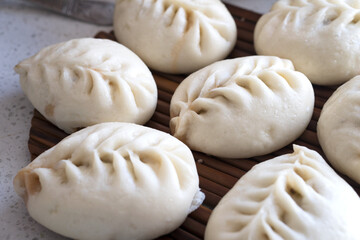 Steamed steamed stuffed bun with white flour