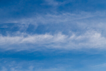 Blue sky cirrus clouds.